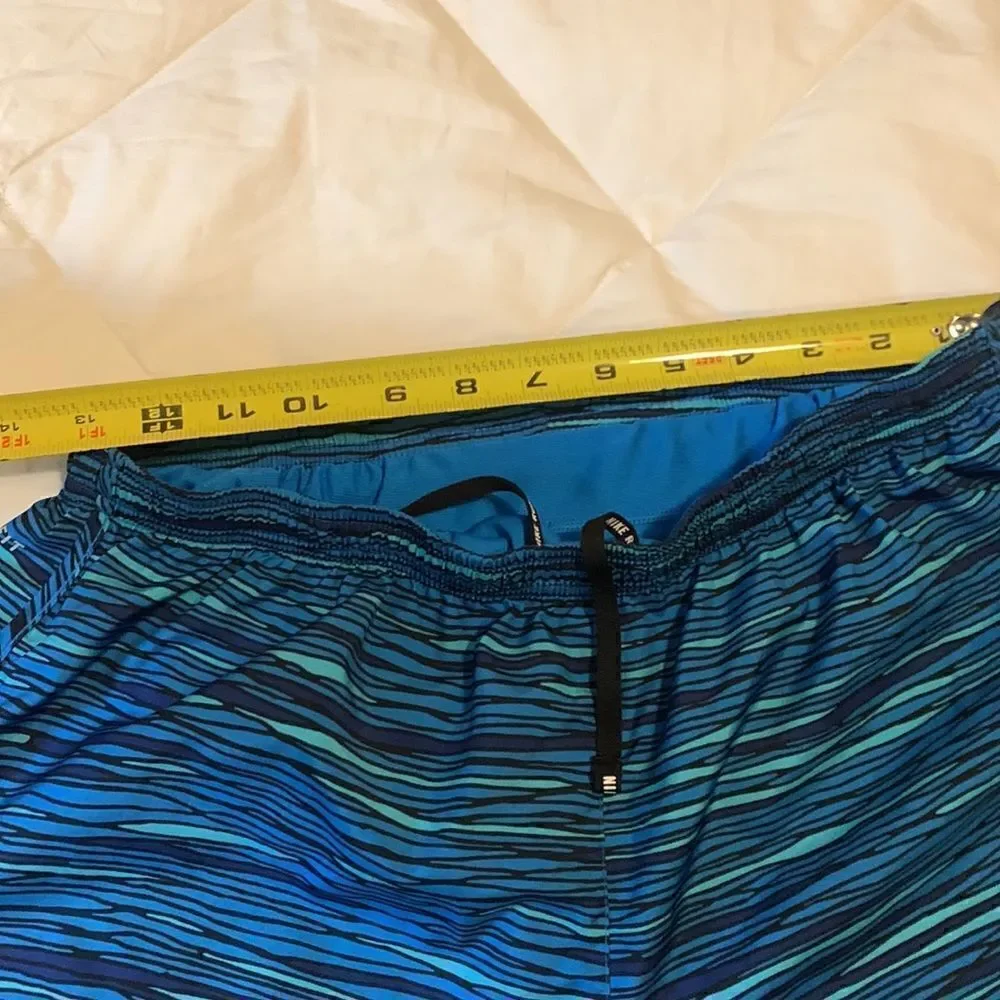 NIKE, running shorts, built in liner, draw cord and vent side, great condition - Picture 9 of 10